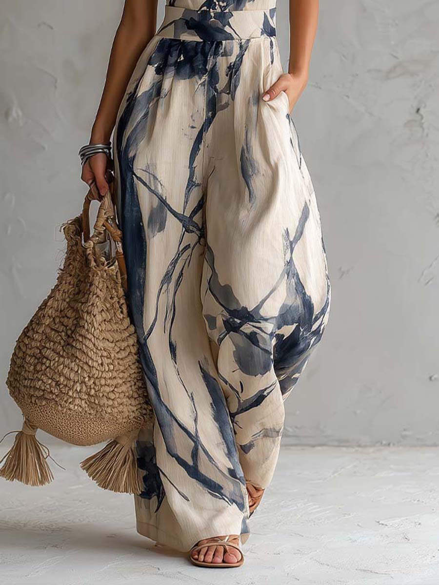 Valeria | Tuta ampia con scollo halter e stampa artistica